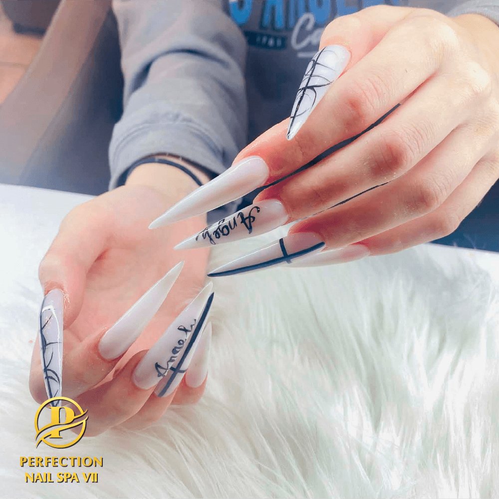 Ultra long stiletto nails with abstract line art